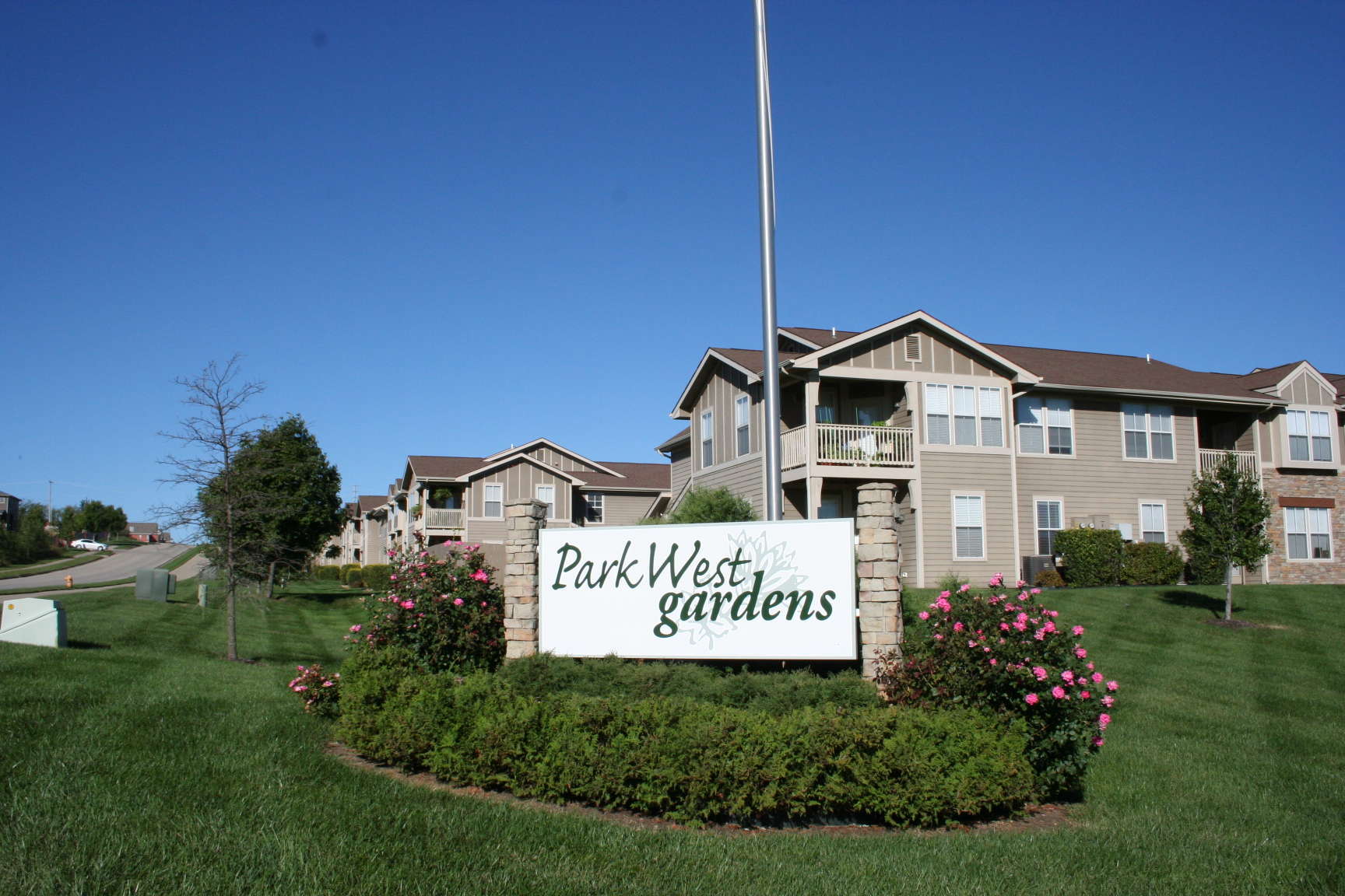 Entrance sign of Park West Gardens in Lawrence