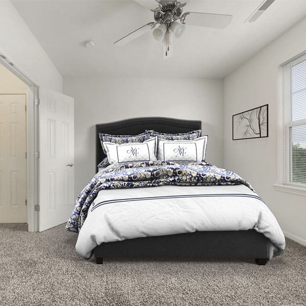 Spacious empty bedroom at Ironwood Court apartment